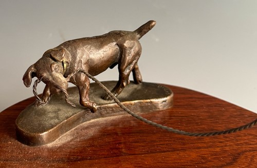 Lot 614 - Kathleen Friedenberg (contemporary), a bronze model of a stallion being led by a terrier, 1988