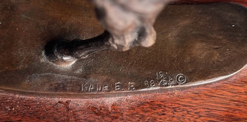 Lot 614 - Kathleen Friedenberg (contemporary), a bronze model of a stallion being led by a terrier, 1988