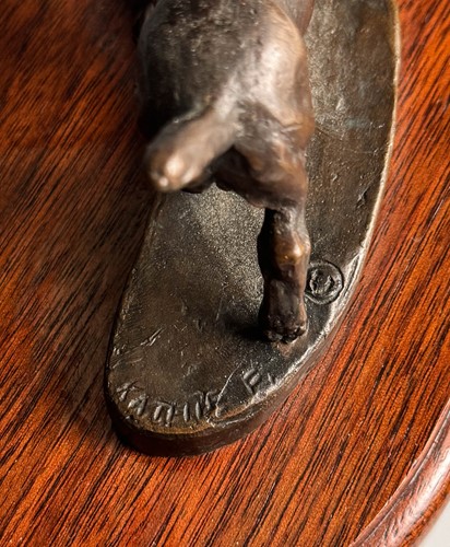 Lot 614 - Kathleen Friedenberg (contemporary), a bronze model of a stallion being led by a terrier, 1988