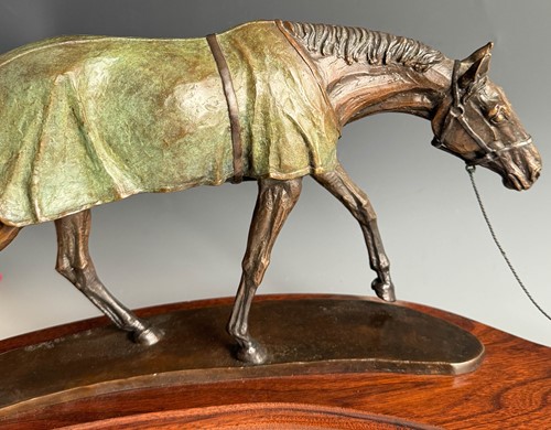 Lot 614 - Kathleen Friedenberg (contemporary), a bronze model of a stallion being led by a terrier, 1988