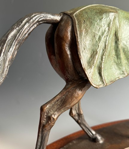 Lot 614 - Kathleen Friedenberg (contemporary), a bronze model of a stallion being led by a terrier, 1988