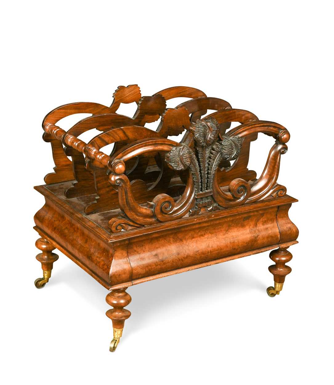 Lot 616 - A Victorian walnut canterbury