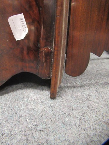 Lot 616 - A Victorian walnut canterbury