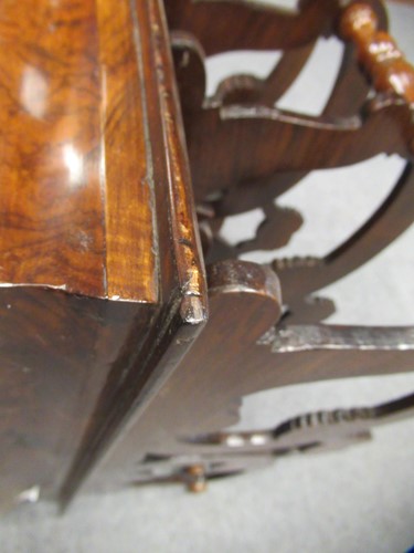 Lot 616 - A Victorian walnut canterbury