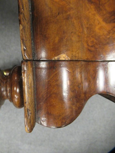 Lot 616 - A Victorian walnut canterbury