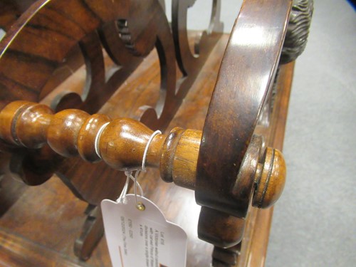 Lot 616 - A Victorian walnut canterbury