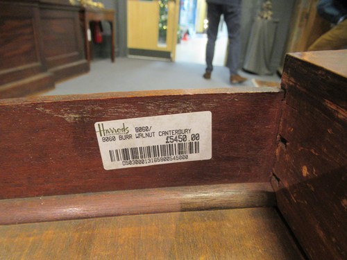 Lot 616 - A Victorian walnut canterbury