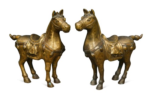 Lot 56 - A pair of Korean inlaid metal standing horses, 20th century