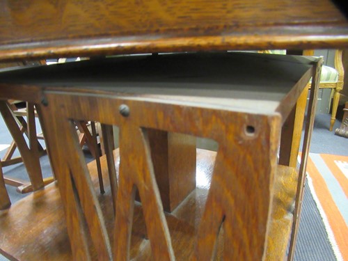 Lot 621 - A revolving oak book stand, early 20th century