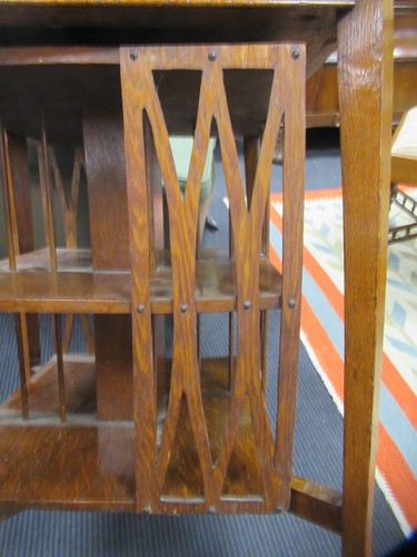 Lot 621 - A revolving oak book stand, early 20th century