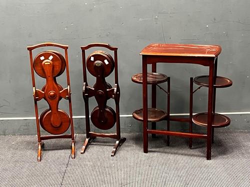 Lot 353 - Two folding mahogany plate stands together...