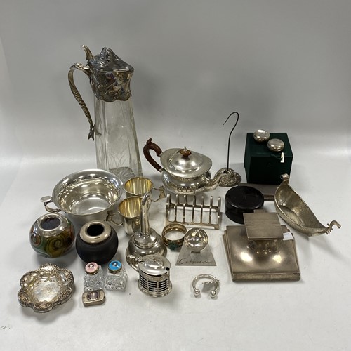 Lot 205 - A collection of silver including teapot, toast...