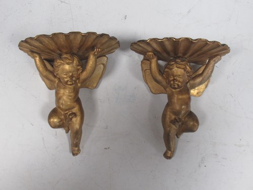 Lot 115 - A pair of late 19th century small giltwood...