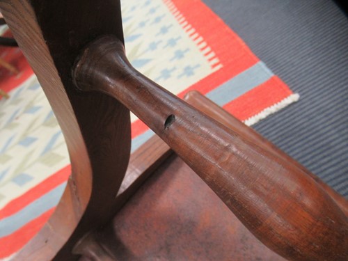 Lot 590 - A Spanish style leather covered chair and foot stool, late 20th century
