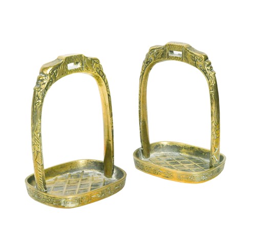 Lot 28 - A pair of Northern Chinese brass stirrups, Qing Dynasty, 19th century