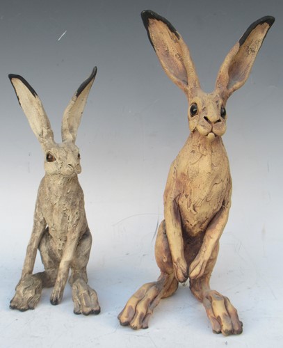 Lot 7 - Two studio pottery models of hares, larger one...