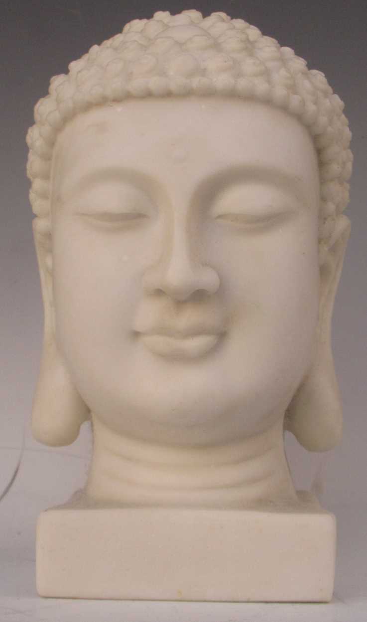 Lot 9 - A reconstituted marble Buddha head