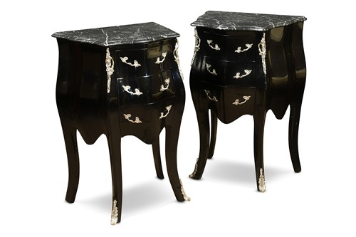 Lot 279 - A pair of modern black lacquered bombé bedside chests