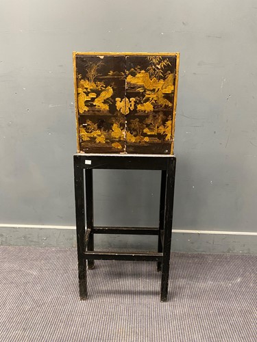 Lot 362 - A Chinese black lacquered cabinet on stand,...