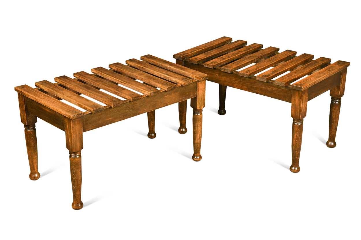 Lot 595 - A pair of Edwardian beech and oak luggage stands