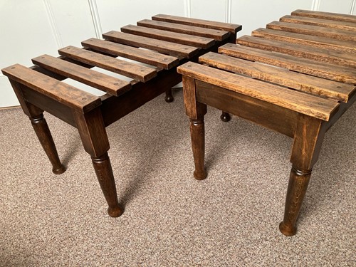 Lot 595 - A pair of Edwardian beech and oak luggage stands