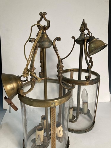 Lot 539 - A near pair of cylindrical brass hall lanterns, early 20th century