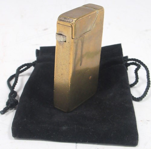 Lot 110 - Dunhill petrol lighter in brass, formerly...