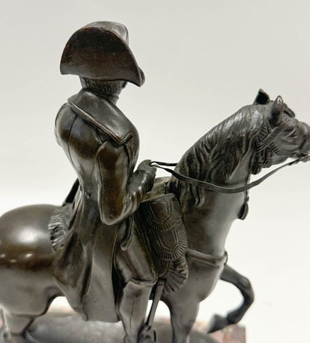 Lot 530 - A Grand Tour bronze model of Napoleon on horseback, mid-19th century