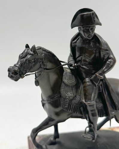 Lot 530 - A Grand Tour bronze model of Napoleon on horseback, mid-19th century