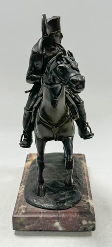 Lot 530 - A Grand Tour bronze model of Napoleon on horseback, mid-19th century