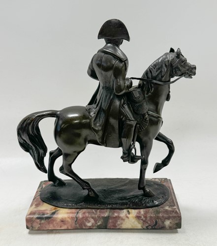 Lot 530 - A Grand Tour bronze model of Napoleon on horseback, mid-19th century