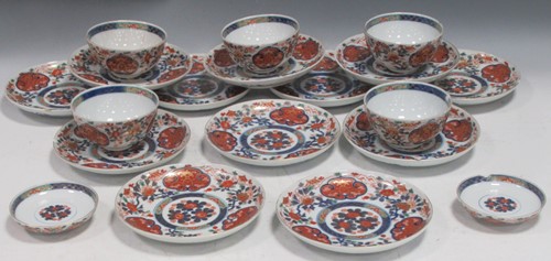 Lot 32 - A set of twelve Japanese Imari porcelain small dishes and five bowls en suite, circa 1900-1910