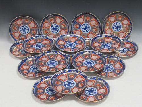 Lot 33 - A set of nineteen Japanese Imari dinner plates, circa 1900-1910