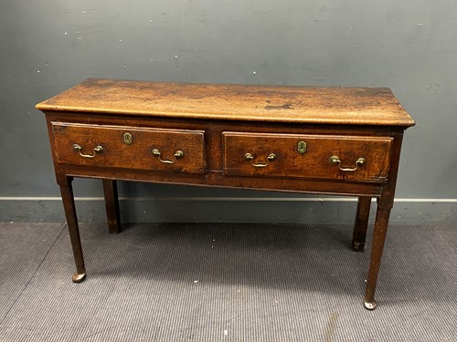 Lot 392 - An oak two drawer side table or dresser base,...