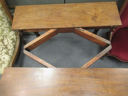Lot 827 - A late Regency mahogany scissor action dining table in the manner of Gillows