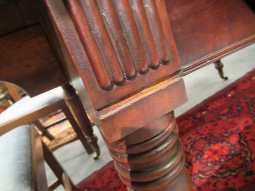 Lot 827 - A late Regency mahogany scissor action dining table in the manner of Gillows