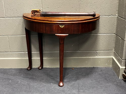 Lot 394 - A mid 18th century mahogany foldover top...