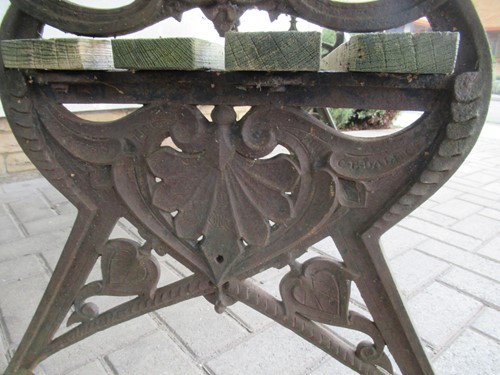 Lot 625 - A Victorian Coalbrookdale 'Lily Pad' pattern garden bench