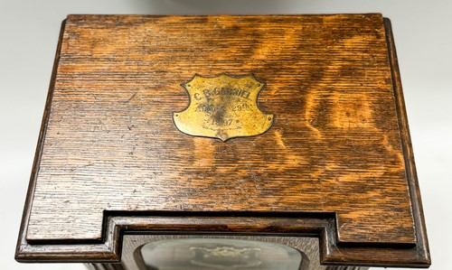 Lot 593 - A late Victorian brass mounted oak table top collector's cabinet