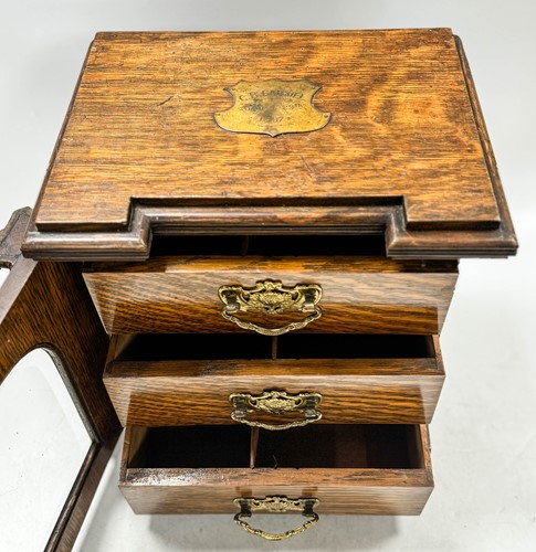 Lot 593 - A late Victorian brass mounted oak table top collector's cabinet