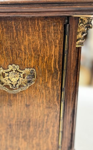 Lot 593 - A late Victorian brass mounted oak table top collector's cabinet