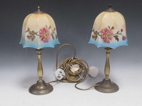 Lot 72 - A pair of Edwardian brass bedside lamps with...