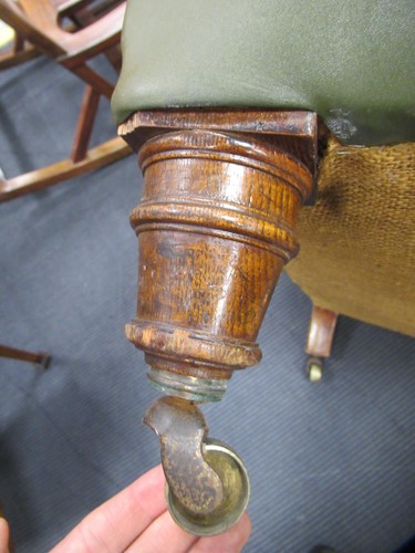 Lot 622 - A Edwardian leather upholstered armchair