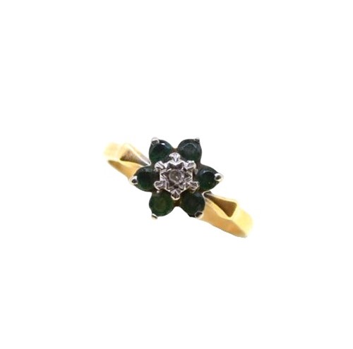 Lot 42 - An emerald and diamond cluster ring