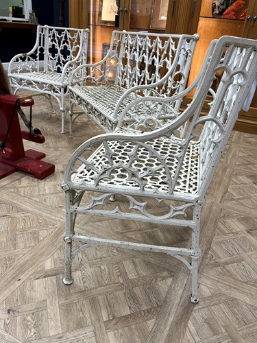 Lot 628 - A pair of cast iron garden seats together with a pair of garden chairs, 20th century