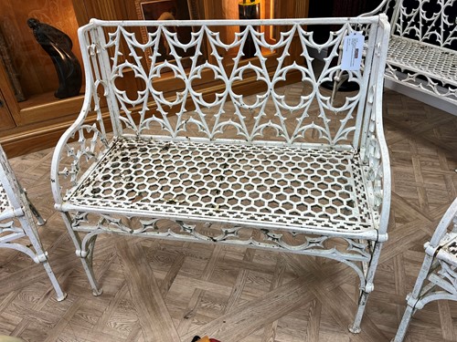 Lot 628 - A pair of cast iron garden seats together with a pair of garden chairs, 20th century