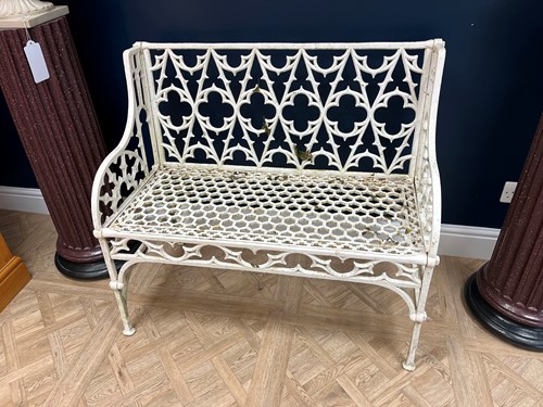 Lot 628 - A pair of cast iron garden seats together with a pair of garden chairs, 20th century