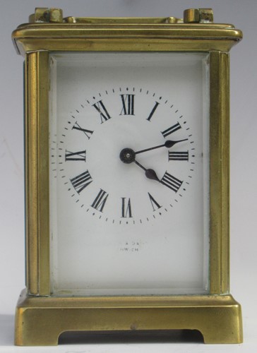 Lot 46 - A brass carriage clock