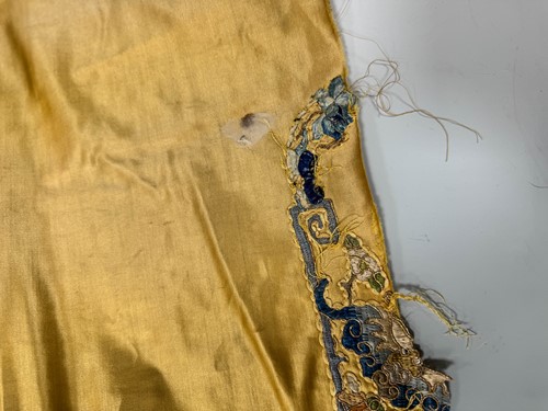 Lot 20 - A Chinese child's blue silk embroidered jacket, early 20th century