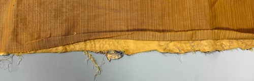 Lot 20 - A Chinese child's blue silk embroidered jacket, early 20th century